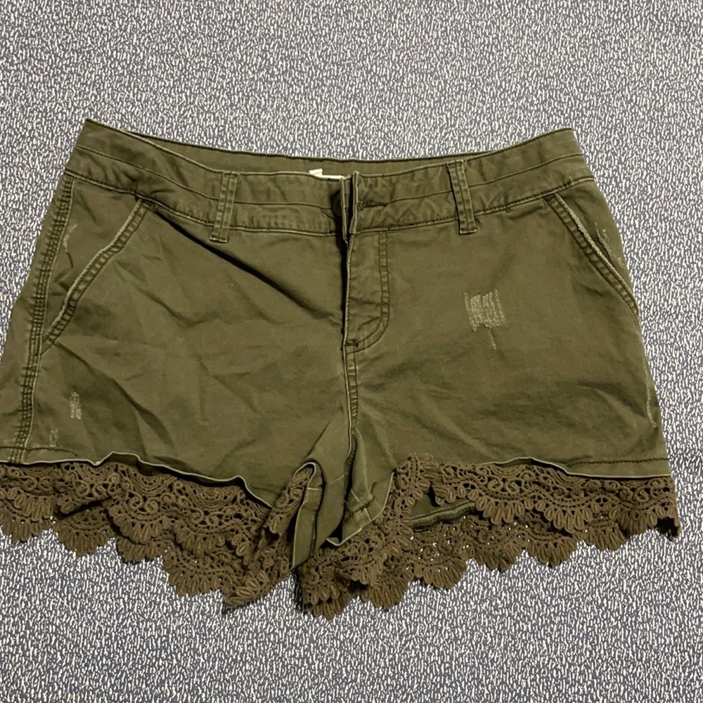 Army green shorts with lace along legs